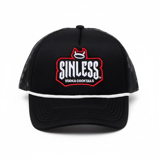 A black trucker hat against a white background. The Sinless logo is written in white across the front of the hat. Vodka cocktails is written under the logo in white. The logo is outlined in red. There is a halo with devil horns at the top of the logo. 
